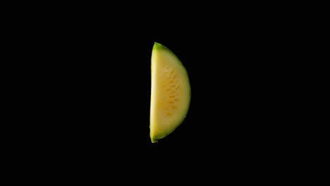 realistic slice of green pumpkin rotating with alpha channel, video in 4k