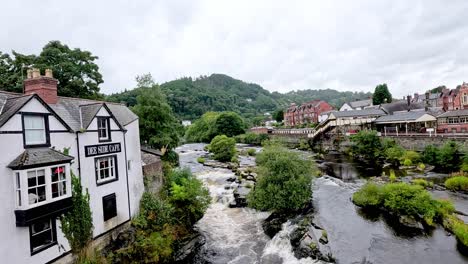 picturesque view of stream and buildings