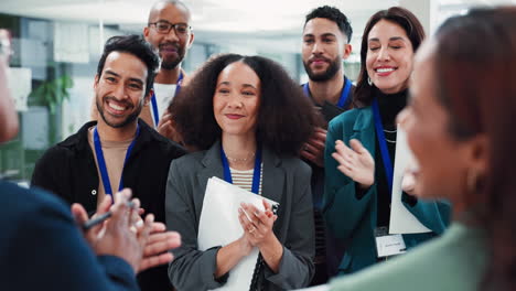 businesspeople applauding at a conference meeting