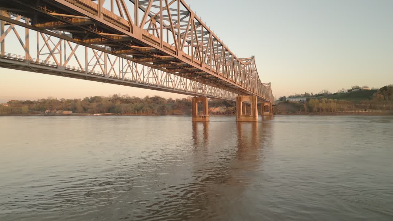 Low lateral drone move along the steelwork over the Mississippi River