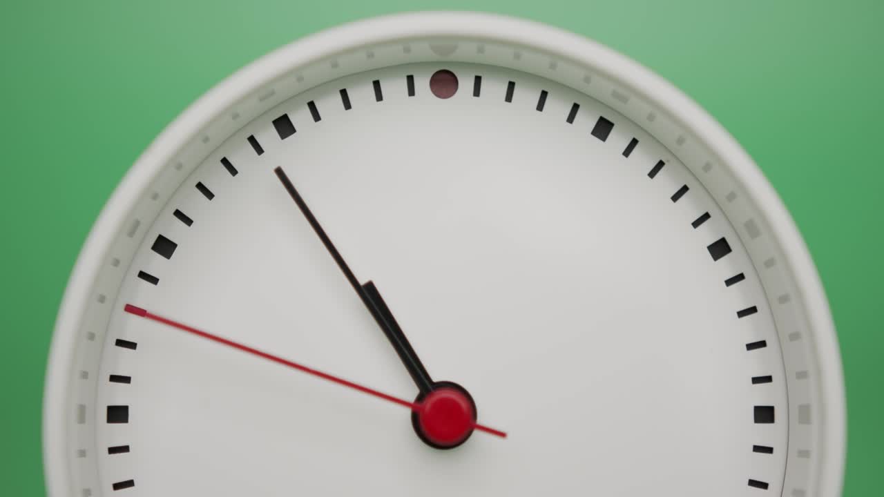 Close up, White clock running a show of time.