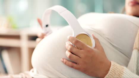 pregnant, woman and headphones on stomach