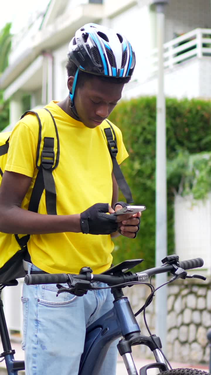 Delivery Person on Bicycle with Mobile Phone