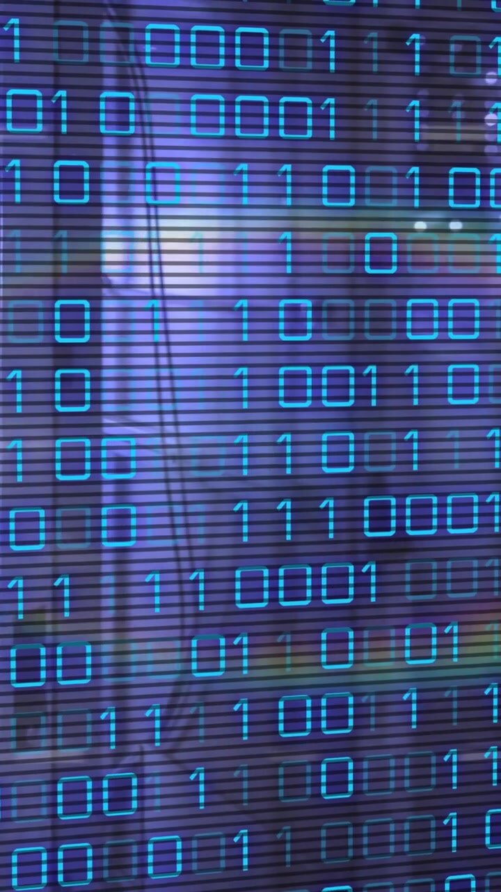 Binary code overlaying cityscape, representing digital animation technology concept