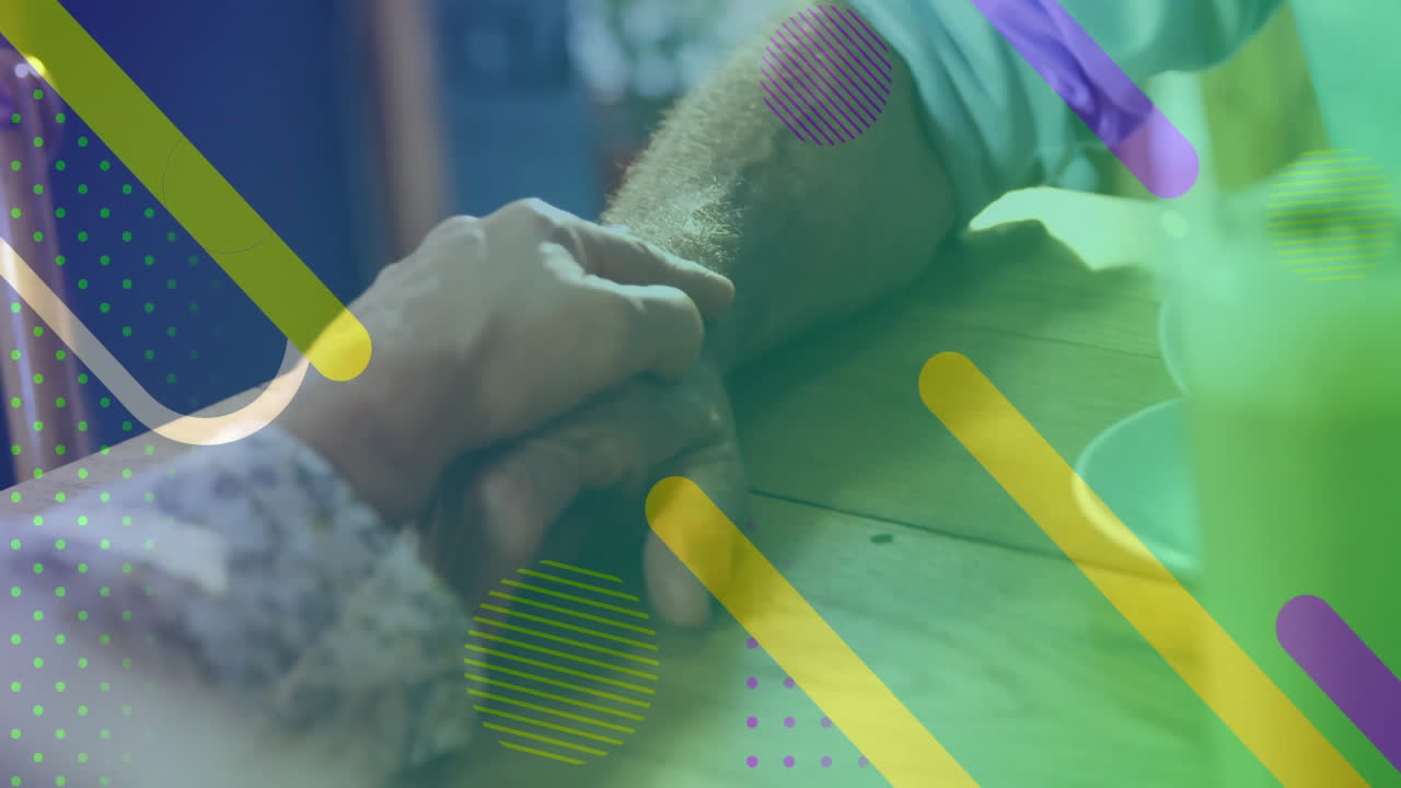 Holding hands over colorful geometric shapes, children creating animation in school