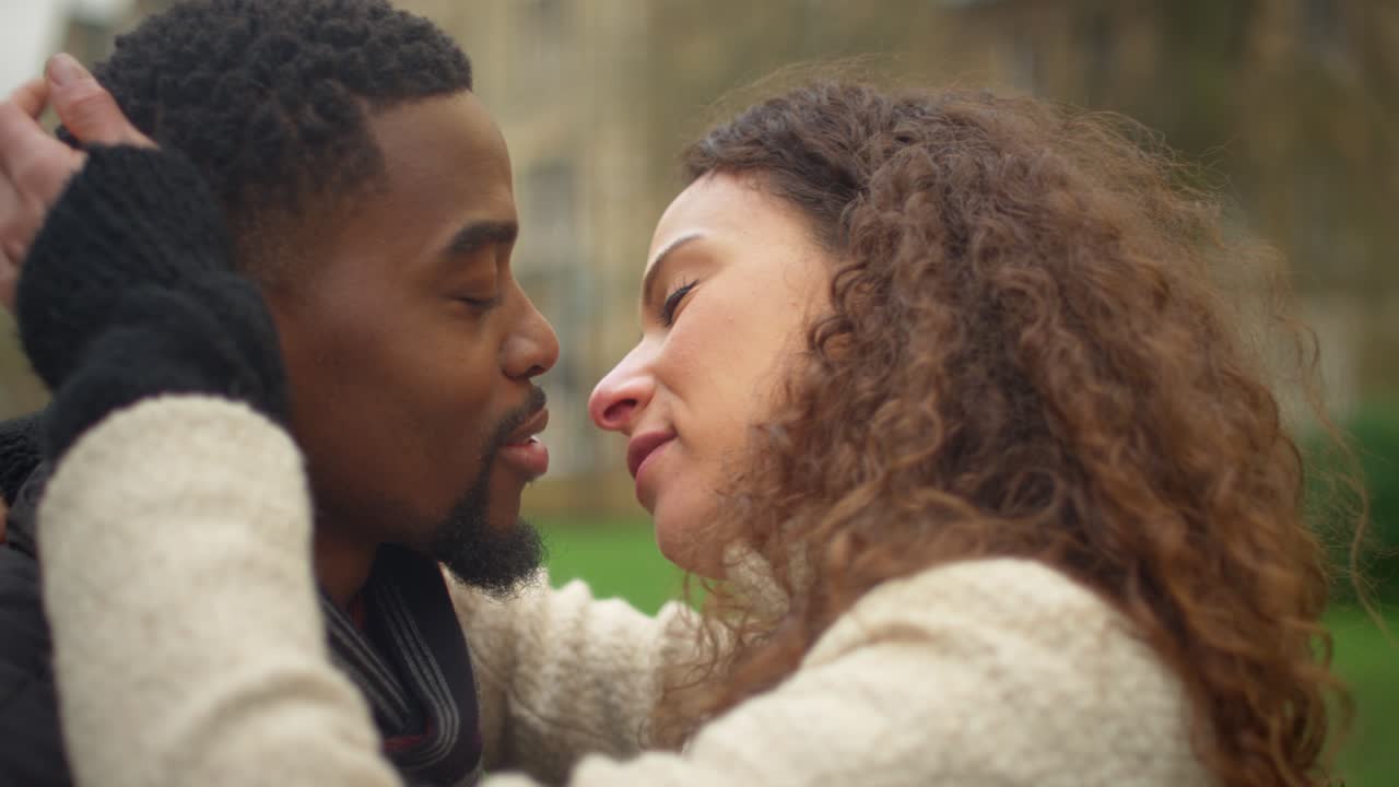 Man and Woman Kissing CU