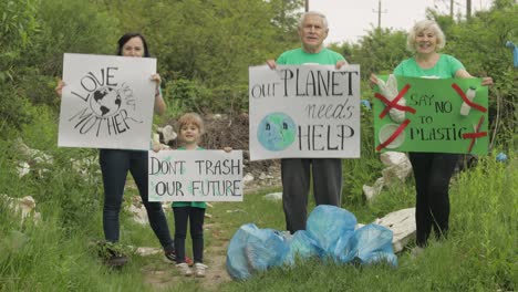 Volunteer-team-holding-encouraging-posters.-Calls-out-slogans.-Reduce-trash-cellophane-pollution