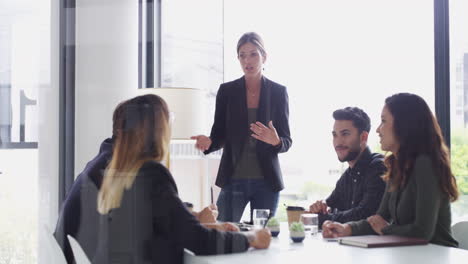 a-group-of-young-businesspeople-having-a-boardroom