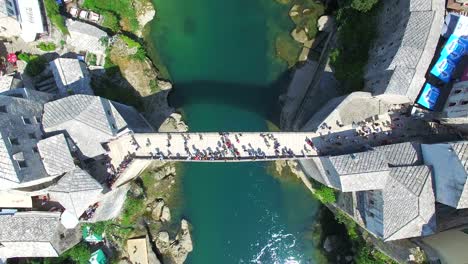 aerial view of bathing spot next to the bridge on neretva river in bosnia