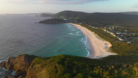 Aerial:-colourful-sunset-over-Pacific-Palms-beach,-NSW-Australia