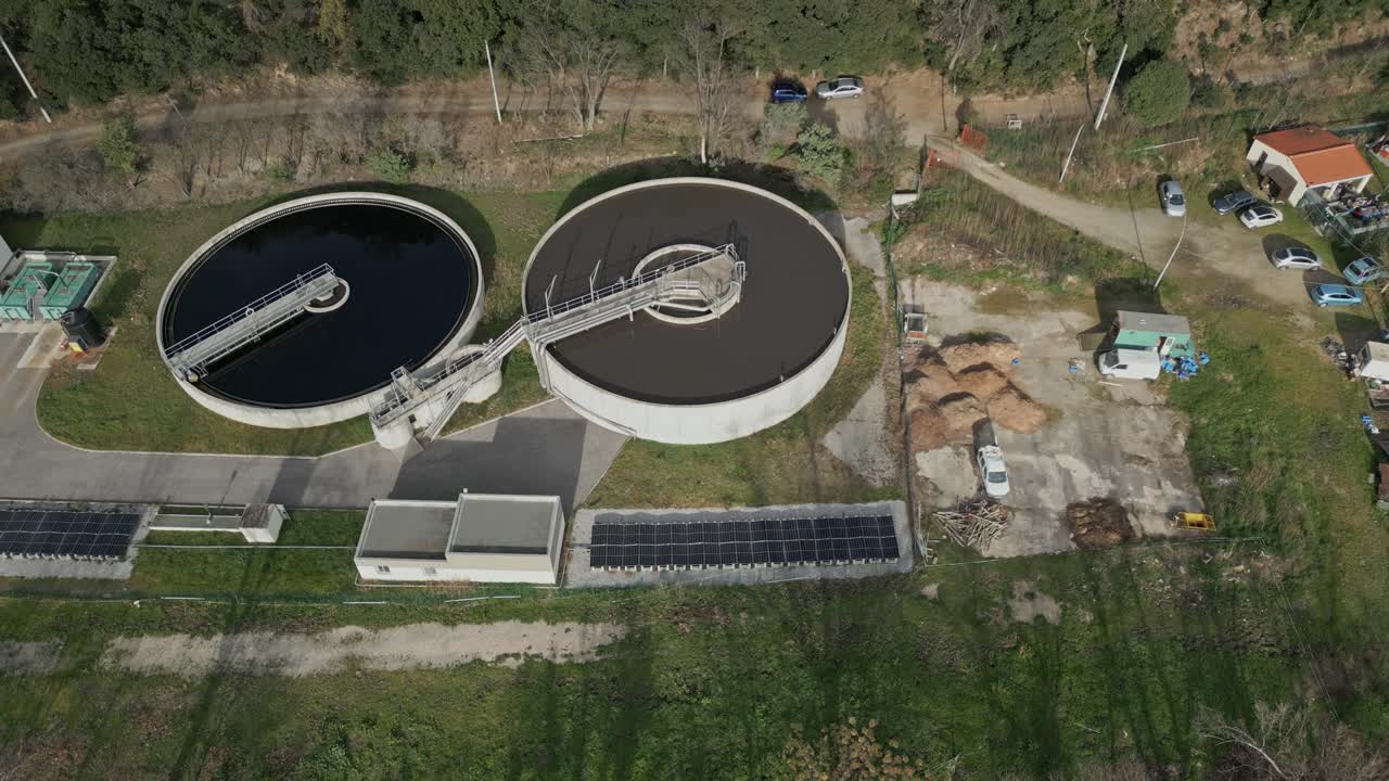 Advanced wastewater treatment facilities processing liquid waste through complex filtration, purification, and cleaning stages, ensuring environmental safety and water quality restoration