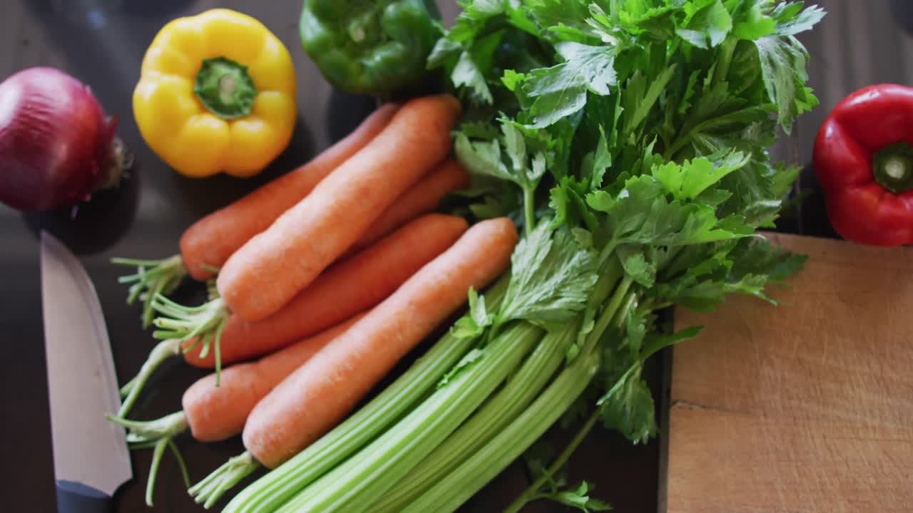 Shot of the vegetables and cutting board on the table