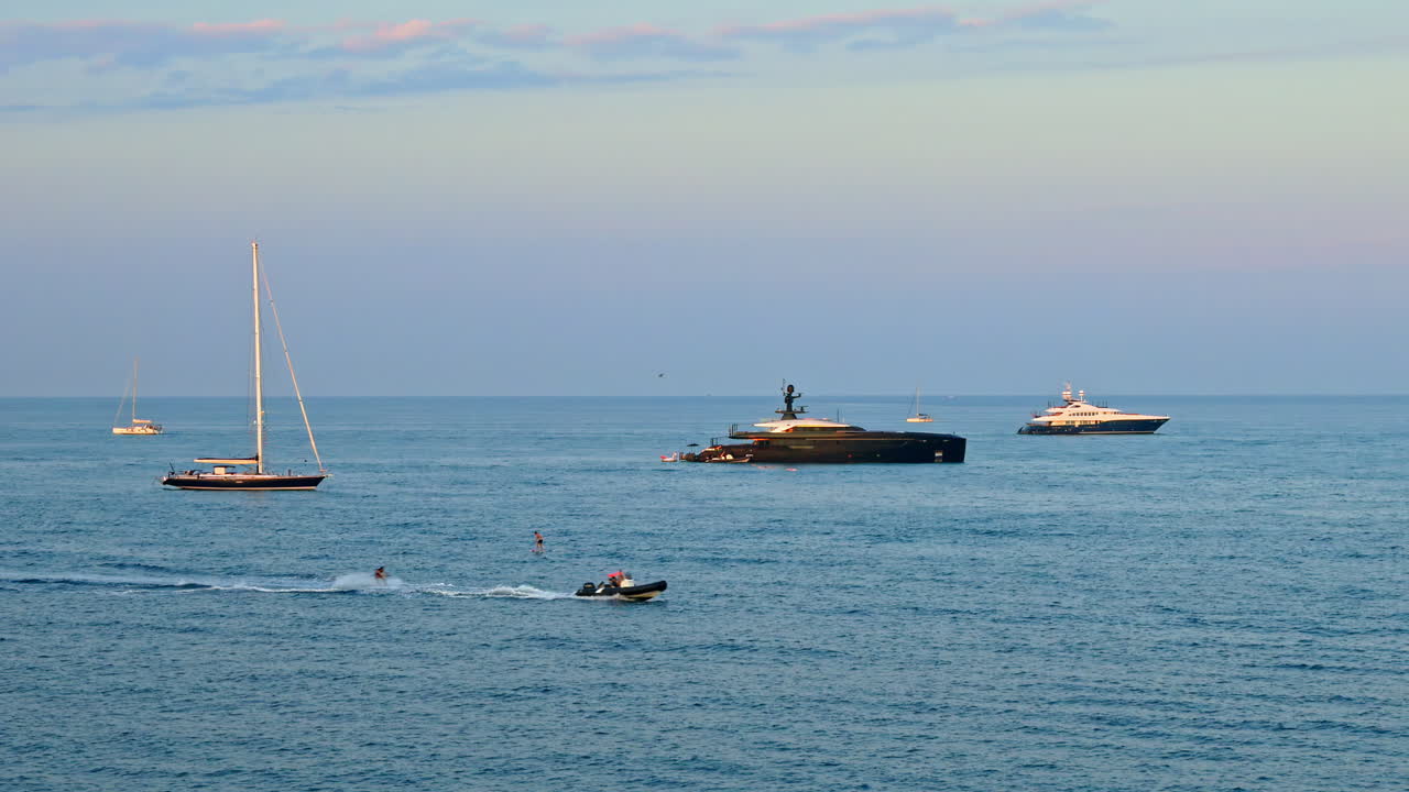 Multiple boats moving on the sea in daylight in Antibes, France