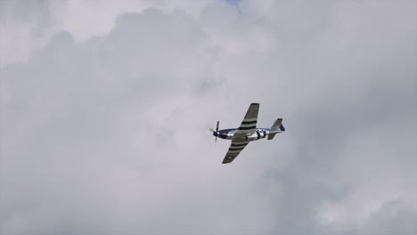 north american p-51 mustang fighter performs aerobatics