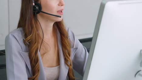 Business-people-wearing-headset-working-in-office