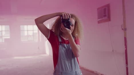 fashionable young woman in an abandoned warehouse