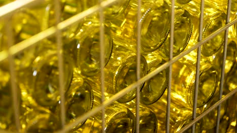 empty wine glass bottles stacked in storage