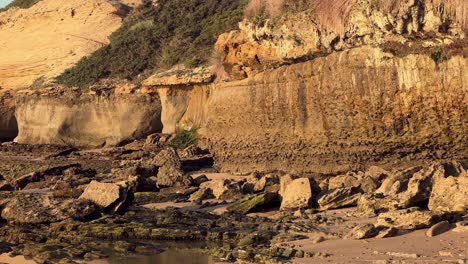 Natural-stone-and-rocky-formations-are-set-against-the-backdrop-of-a-tranquil-blue-sky