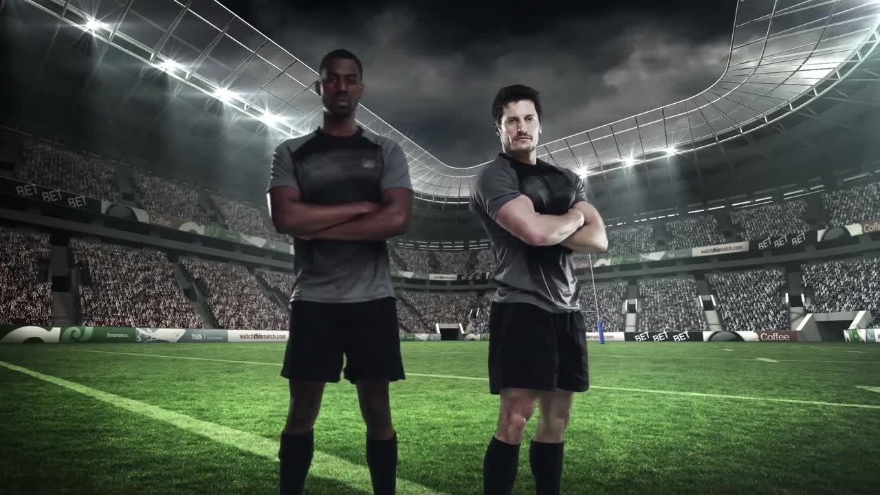 dos jugadores de rugby serios posando