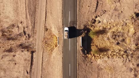 Adventure-Across-Endless-Dunes:-4K-drone-shot-of-Desert-Drive-in-Namibia,-Africa-with-Rooftop-Tented-4x4-Toyota-Hilux