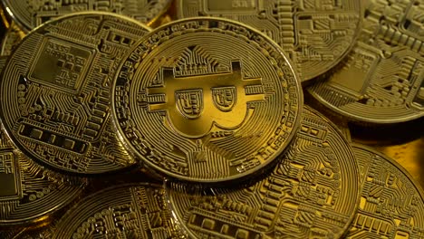 Pile of golden bitcoin coins