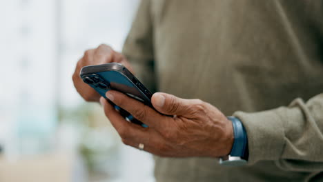 Closeup,-hands-and-man-with-a-smartphone