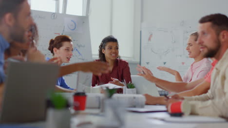 Business-partners-working-with-documents-in-office.-Team-discussing-contract.