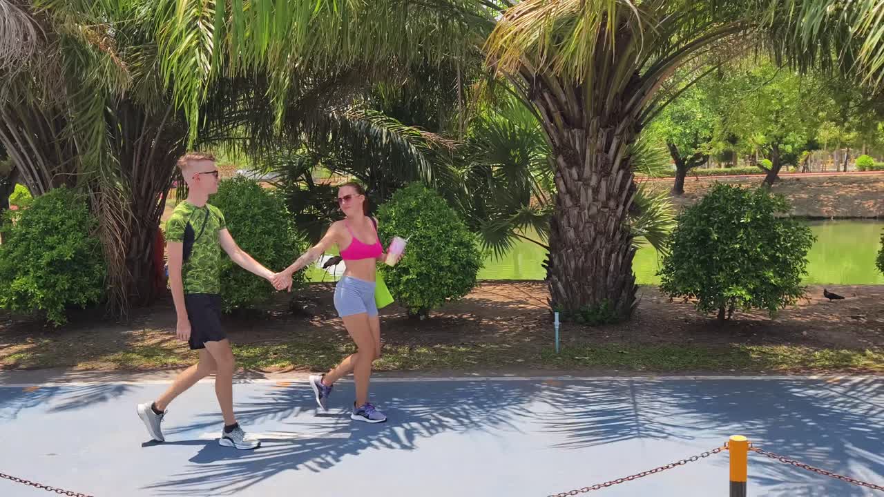 Couple Enjoying a Stroll in a Park