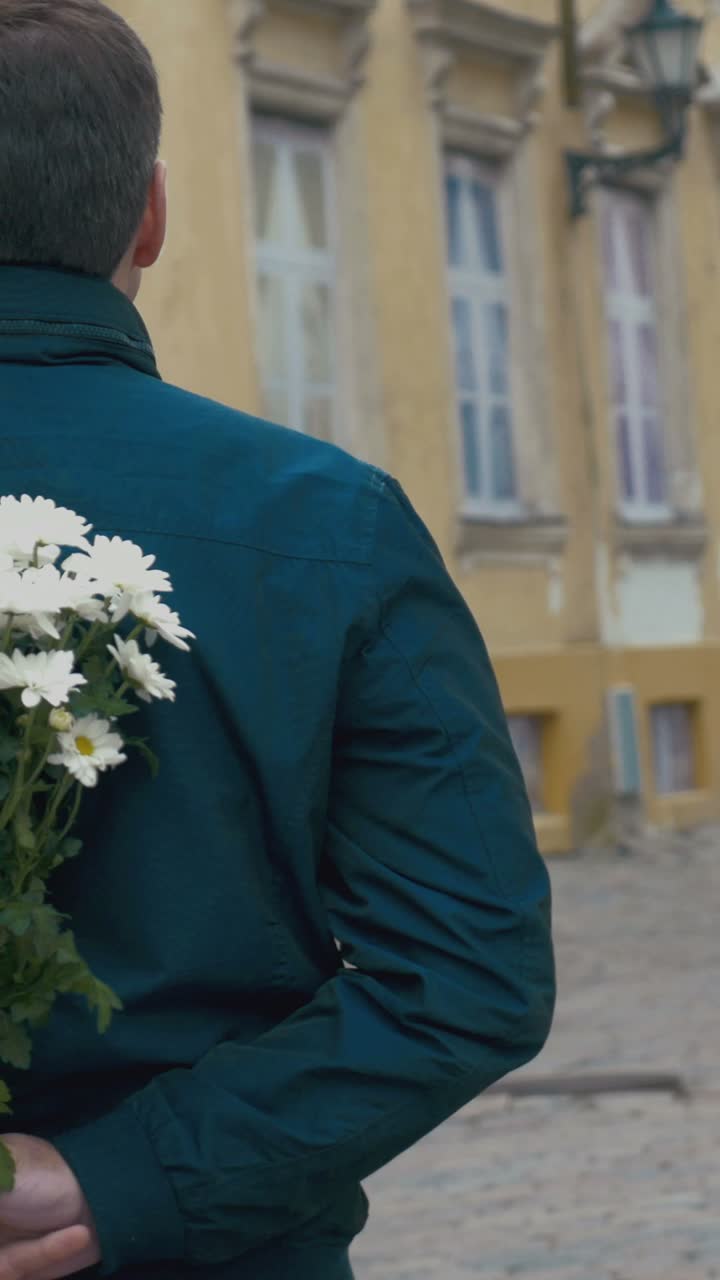 A loving couple embracing on a city street