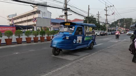 schoolchildren waiting, crossing street with vehicles passing by