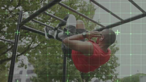 Animation-of-digital-grid-over-male-athlete-with-prosthetic-leg-exercising-on-monkey-bars-outdoors
