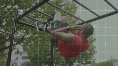 Animation of digital grid over male athlete with prosthetic leg exercising on monkey bars outdoors