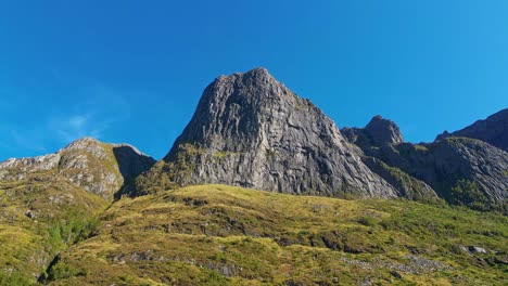 aerial of the peaks and hills near syvdefjorden in the vanylven municipality, norway