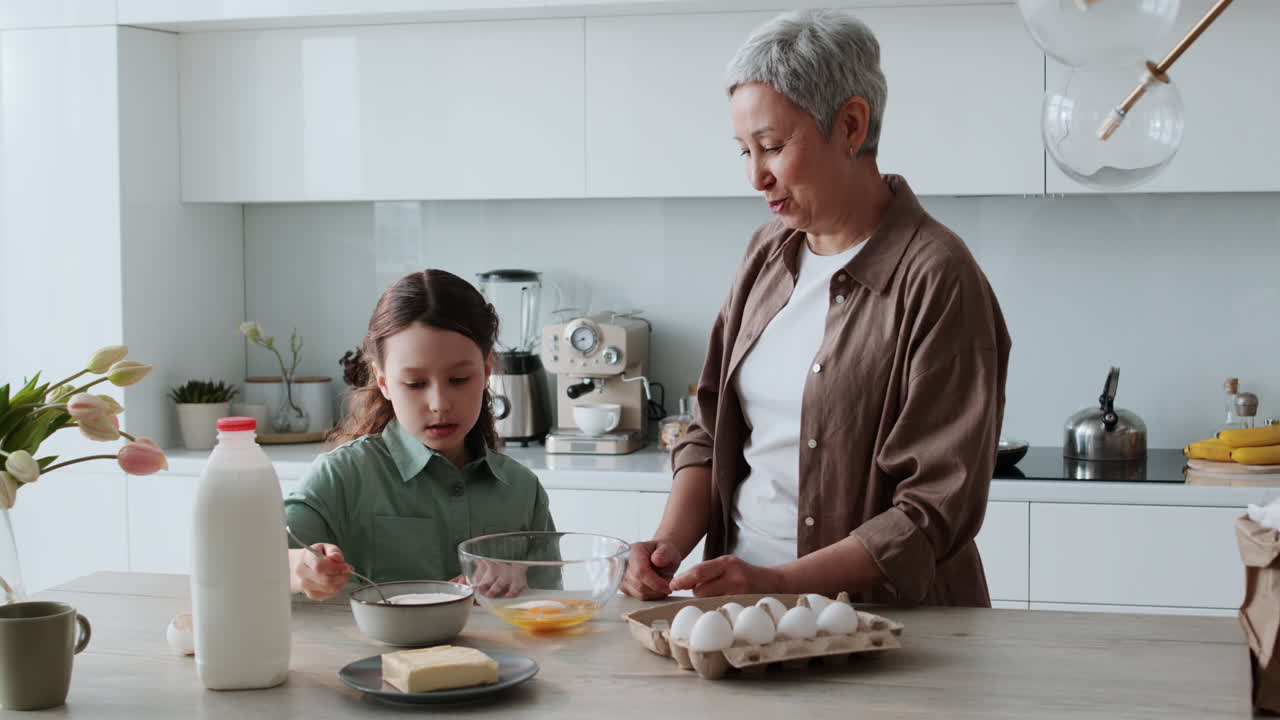 Grandma and girl baking