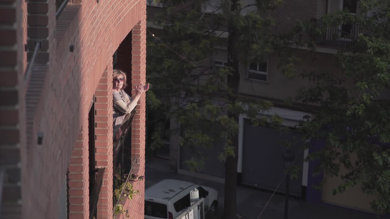 Woman on Balcony Applauding