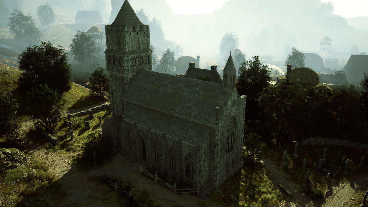 Old stone church surrounded by trees in a misty landscape at dawn
