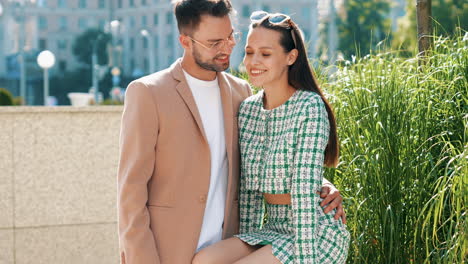 couple posing outdoors