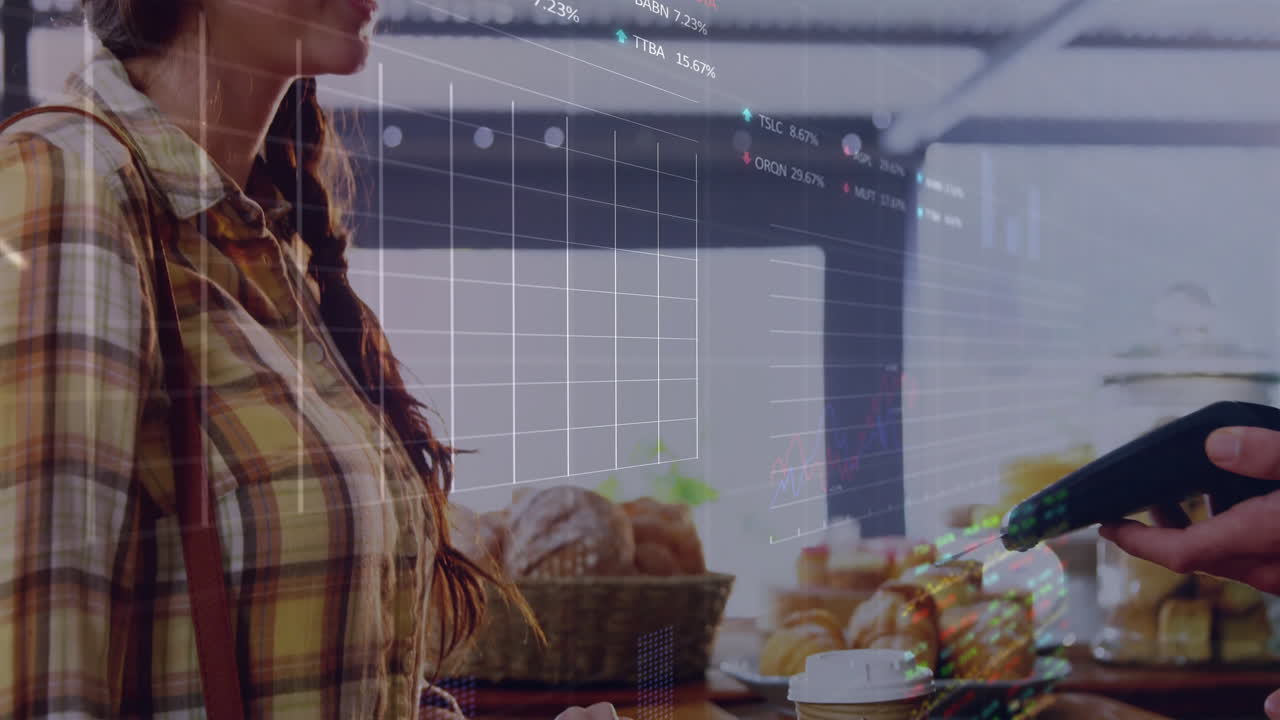 Woman leaning on bakery counter using card terminal, showing finance charts and transaction graphs