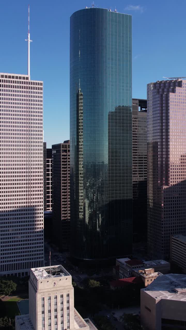 City skyline featuring modern skyscrapers and a historic building