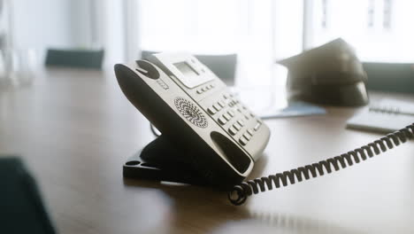 Man-using-phone-on-desk