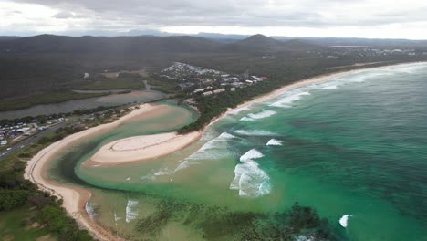 cudgera creek and scenic seascape in hastings point, new south wales, australia - aerial drone shot