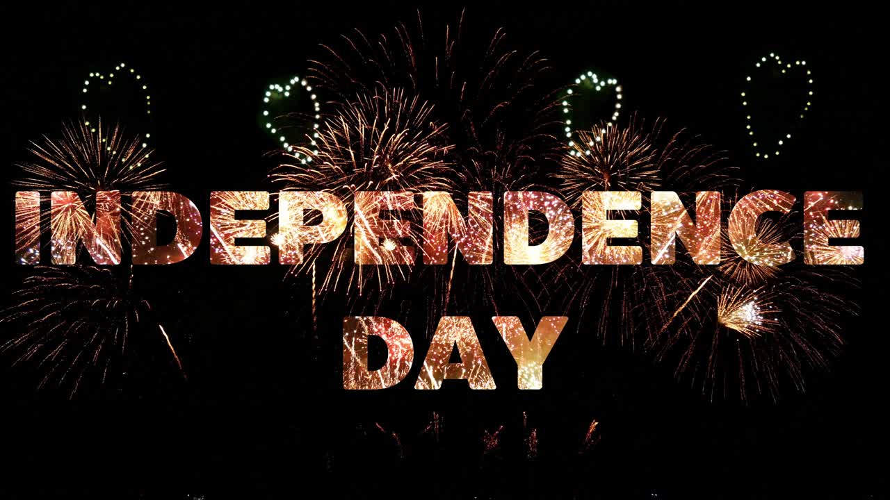 4K. firework of Independence Day celebration, loop of real golden fireworks and heart shape  festival in the sky display at night with colorful