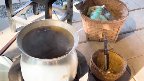 boiling silk in dye at jim thompson farm