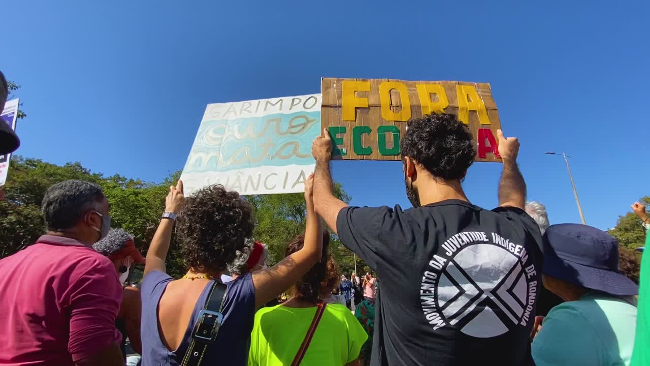 a protesting mass of people against the murders in the amazon areas in brazil of the brit dom phillips and the brazilian bruno pereira