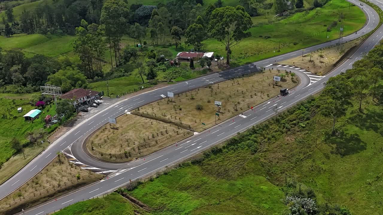 Rural highway interchange surrounded by greenery