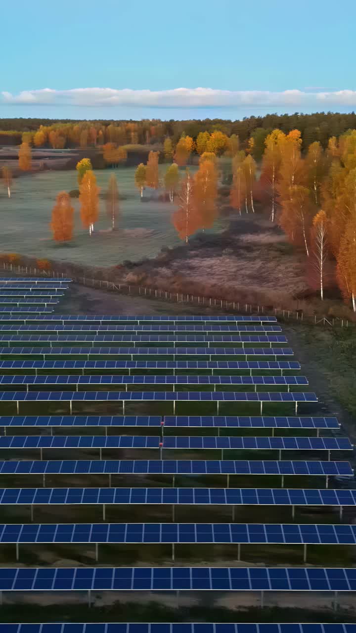 Aerial vertical view of solar panel field and rural area of Latvia