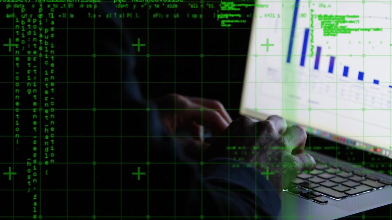 Animation of data processing over hands of male hacker using laptop