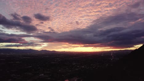 tilting up shot from scottsdale, arizona to a beautiful sunlit pink sky