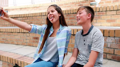 School-kids-taking-selfie-from-mobile-phone