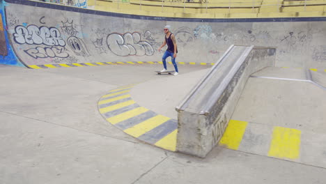 young boy using skate board in a street park